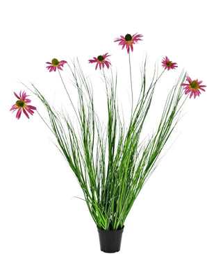 Kunstgræsplanten Chrysanthemum 100 cm brandhæmmende er en potteplante med lange grønne blade og lange stængler toppet med lyserøde tusindfrydlignende blomster, mod en hvid baggrund.