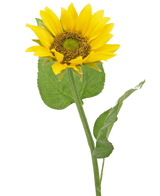 Artificial Sunflower Deluxe 52 cm er en kunstig solsikke med knaldgule kronblade, et mørkebrunt hjerte og grønne blade på en lang stilk, fotograferet mod en almindelig hvid baggrund.